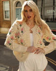 Cardigan all'uncinetto con fiori